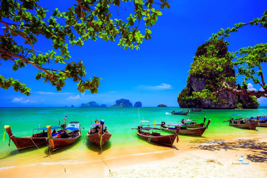 Long-tail boats at Railay Beach Krabi Thailand – Auasia Travel